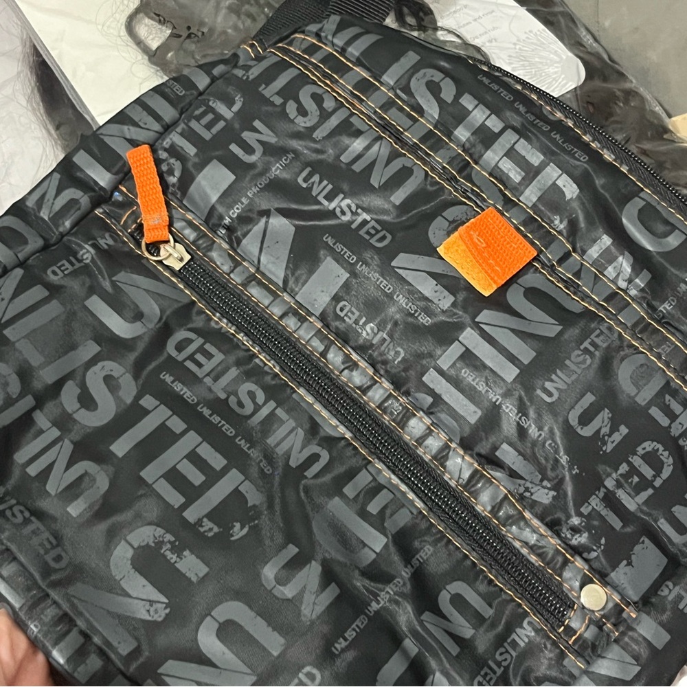 Black and Orange Zippered Poush
